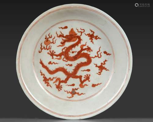 A CHINESE IRON-RED-DECORATED 'DRAGON' DISH, MING DYNASTY (16...