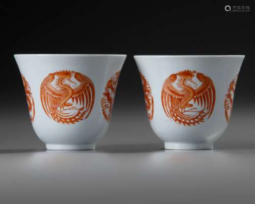 A PAIR OF CHINESE IRON-RED 'DRAGON AND PHOENIX' CUPS