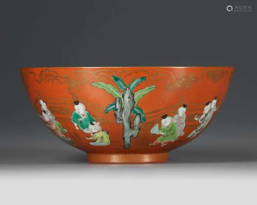 A FINE CHINESE CORAL-GROUND FAMILLE VERTE 'BOYS' BOWL, JIAQI...