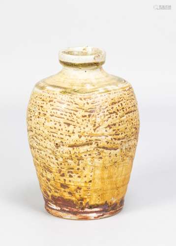 MIKE DODD (born 1943); a stoneware bottle covered in mottled...