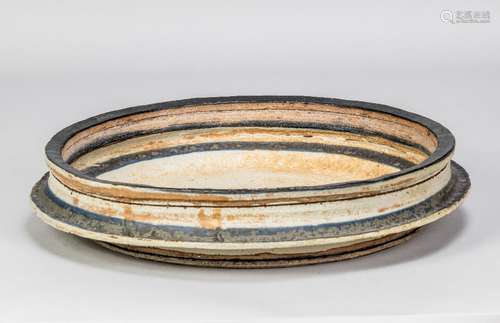 ROBIN WELCH (1936-2019); a large stoneware flanged dish with...