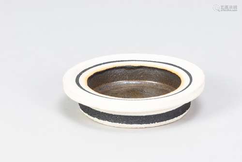 ROBIN WELCH (1936-2019); a small stoneware bowl with wide ri...