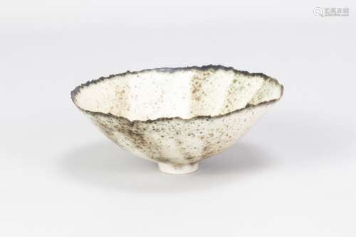 DEIRDRE BURNETT (born 1939); a porcelain footed bowl covered...