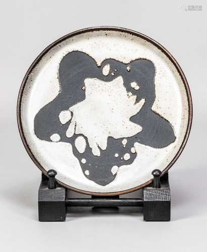 BARBARA CASS (1921-1992); a stoneware plate with white glaze...