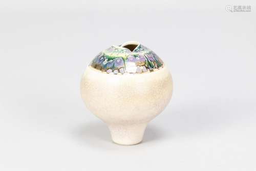 GEOFFREY SWINDELL (born 1945); a small porcelain pot covered...