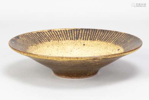 GEORGE WILSON (1924-2004); a shallow stoneware bowl covered ...
