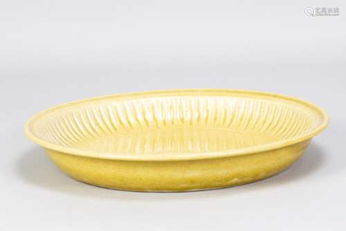 POH CHAP YEAP (1927-2007); a fluted stoneware dish covered i...