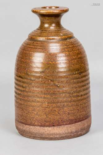 DAVID LLOYD JONES (1928-1994); a stoneware bottle covered in...