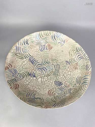 ROGER PERKINS (born 1952); a monumental raku dish covered in...