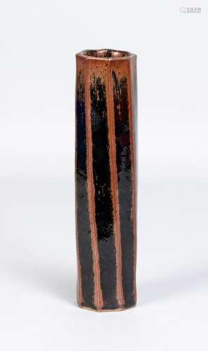 ANDREW CROUCH (born 1955); a cut sided stoneware vase covere...
