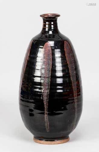 CHARLES VYSE (1882-1971); a tall stoneware bottle covered in...