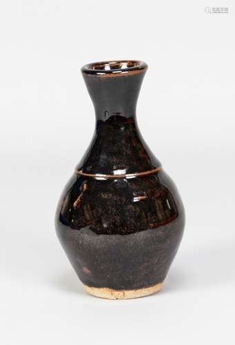 URSULA MOMMENS (1908-2010); a small stoneware bottle covered...