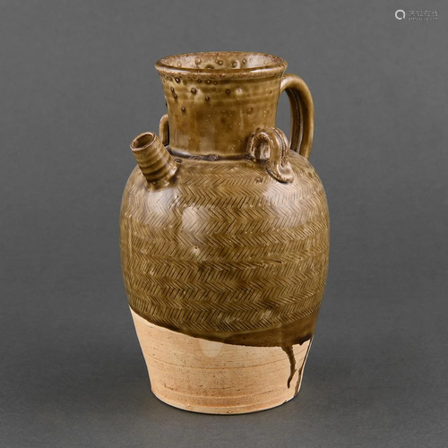 A RARE 'CIZHOU'-TYPE AMBER-GLAZED EWER