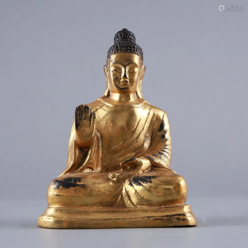 A GILT-BRONZE FIGURE OF BUDDHA