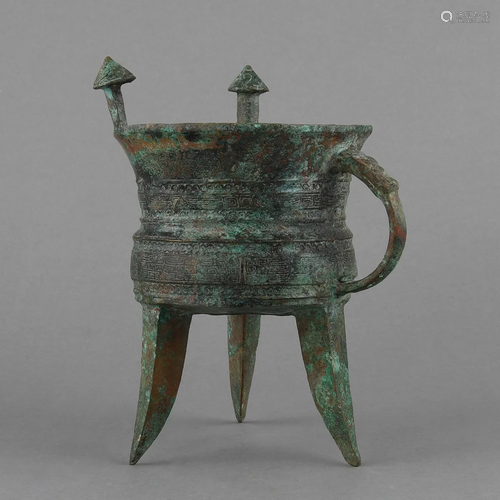 AN ARCHAIC BRONZE RITUAL WINE VESSEL (JIA)