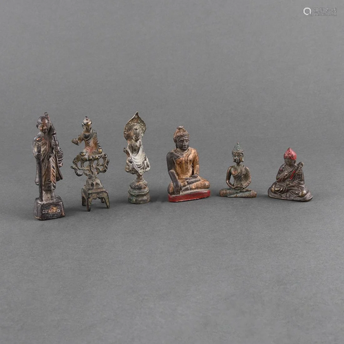 A SET OF SIX SMALL FIGURES OF BUDDHAS