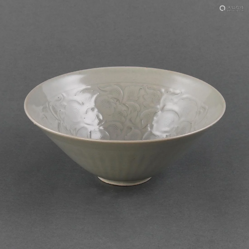 A LARGE CARVED 'YAOZHOU' 'PEONY' BOWL