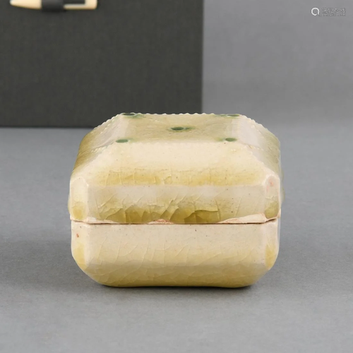 AN UNUSUAL CELADON SQUARE BOX AND COVER