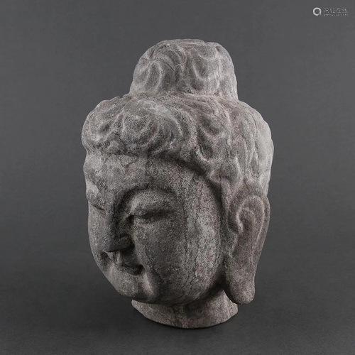 A CARVED STONE HEAD OF BUDDHA, TANG-STYLE