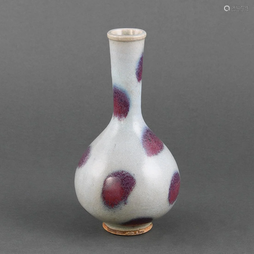 A RARE 'JUN' PURPLE-SPLASHED BOTTLE VASE