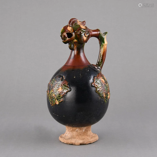 A RARE SANCAI-GLAZED 'PHOENIX' EWER