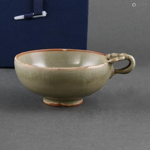 A LONGQUAN CELADON HANDLED CUP