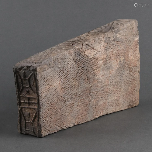 A CHINESE 'JIN' BRICK INSCRIBED 'WANG'