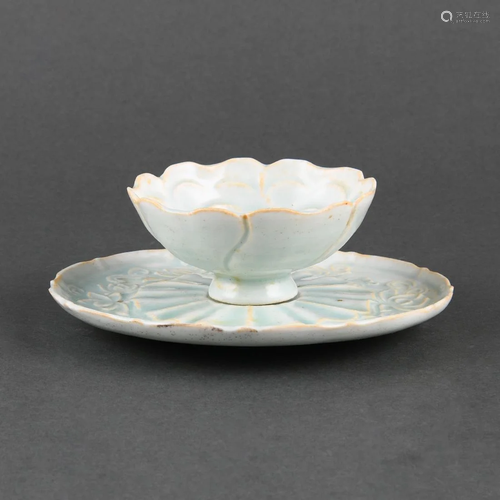 A RARE 'QINGBAI' FOLIATE CUP AND SAUCER