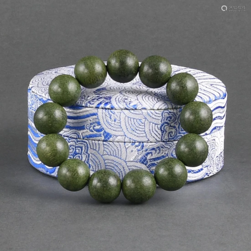 A BRUNEI CHENXIANGMU BEADED BRACELET