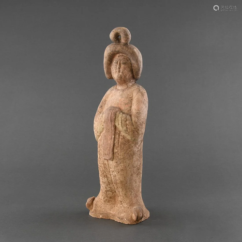 A POTTERY FIGURE OF A 'FAT LADY'