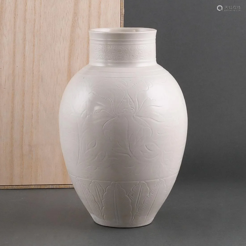 A CARVED 'DING' WHITE-GLAZED 'LOTUS' VASE