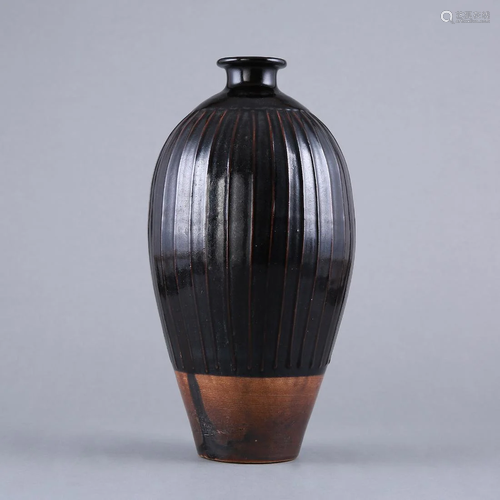 A RARE 'CIZHOU' BLACK-GLAZED RIBBED MEIPING