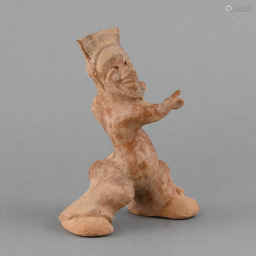 A PAINTED POTTERY FIGURE OF AN ENTERTAINER