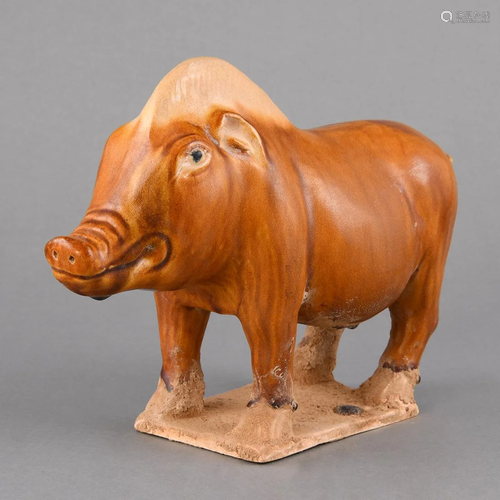 CHESTNUT-GLAZED POTTERY FIGURE OF A BOAR