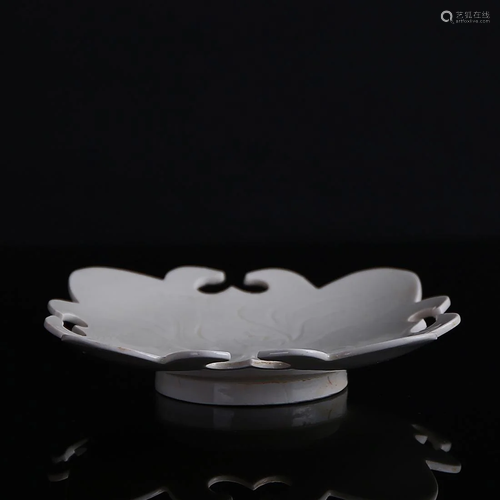 A 'DING' WHITE-GLAZED CARVED 'LOTUS' SQUARE DISH