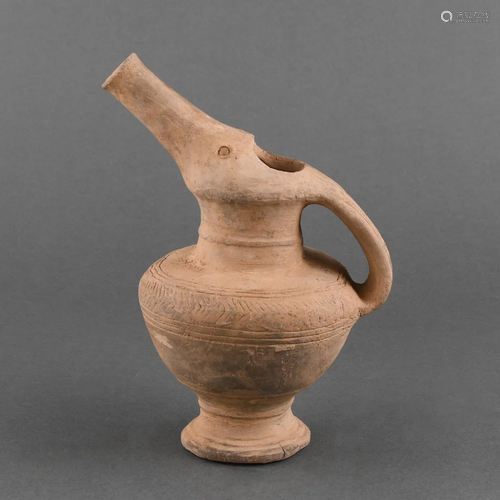 A NEOLITHIC POTTERY EWER, HE