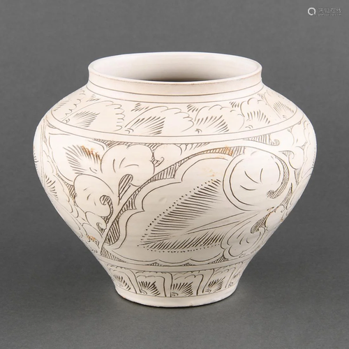 A RARE 'HENAN' CARVED 'PEONY' JAR