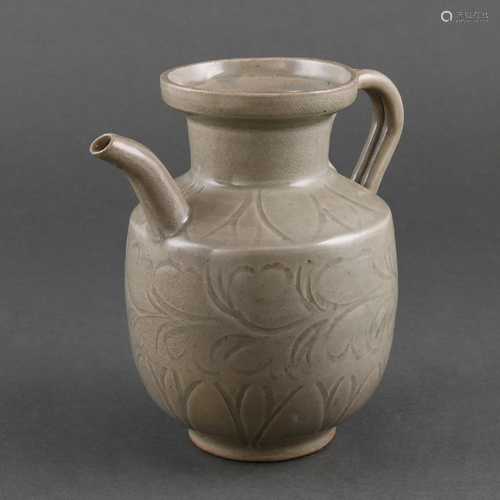 A CARVED 'YUE' CELADON EWER