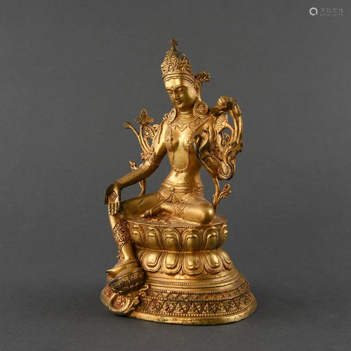 A GILT-BRONZE FIGURE OF GREEN TARA