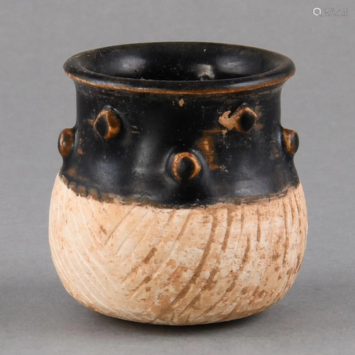 A SMALL 'CIZHOU' BLACK-GLAZED JAR