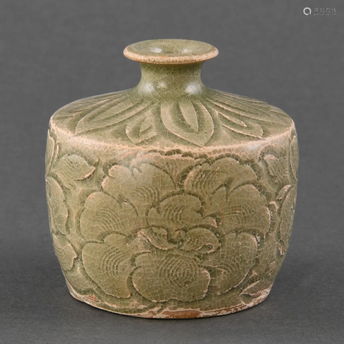 A SMALL CARVED YAOZHOU 'PEONY' 'TULU' BASE