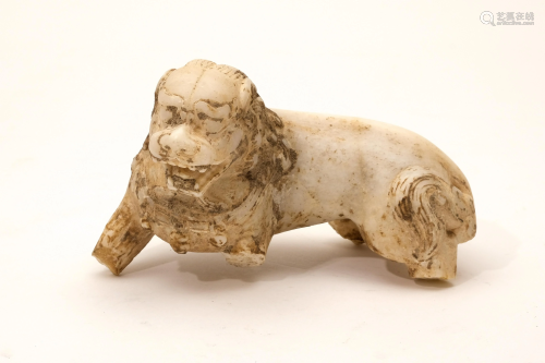 A Carved White Jade Lion