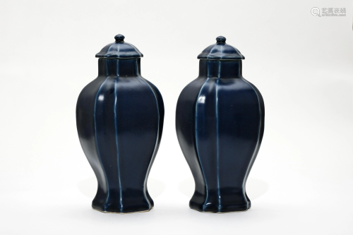 A Pair of Octagonal Blue Glazed Vases with Lids