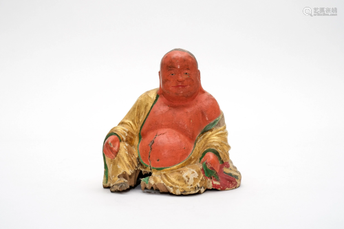 A Carved Wooden Gilt Maitreya Figure