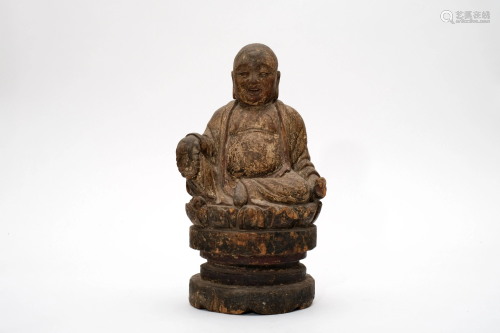 A Carved Wooden Maitreya Figure