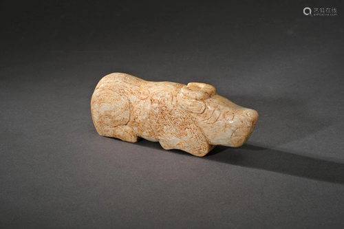 A Carved Jade Pig Figure