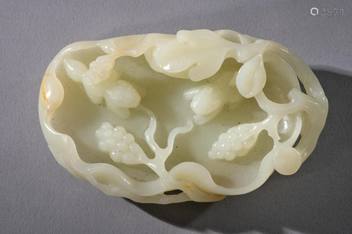 A Carved Hetian White Jade Squirrel and Grapes Brush