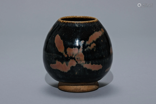 A Black Glazed Floral Vase