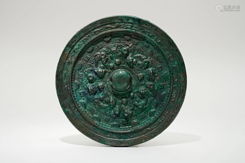 A Bronze Mirror with Figural and Beasts