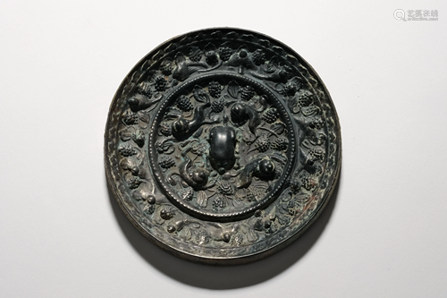 A Four Sea Beast with Grapes Bronze Mirror